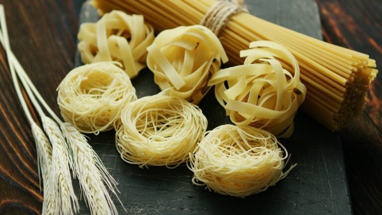 Uncooked spaghetti and wheat